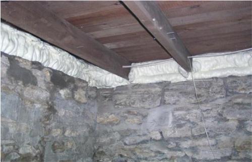 During a home cottage or commercial inspection in the Orillia, Gravenhurst,Bracebridge and Muskoka area we often find improperly installed vapour barrier.  Her we see the finished foaming over an old stone foundation in a crawlspace. An ideal use for the DIY spray foam kit.  a home cottage or commercial building.