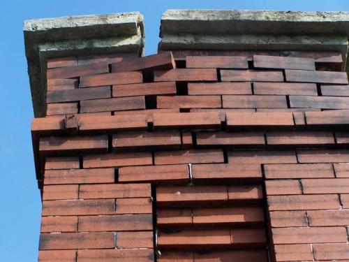 Brickwork like this is an obvious fault It is the repair that is substandard you can not see that can lead to major defects down the road.